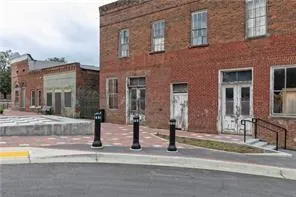 a front view of a building with street view
