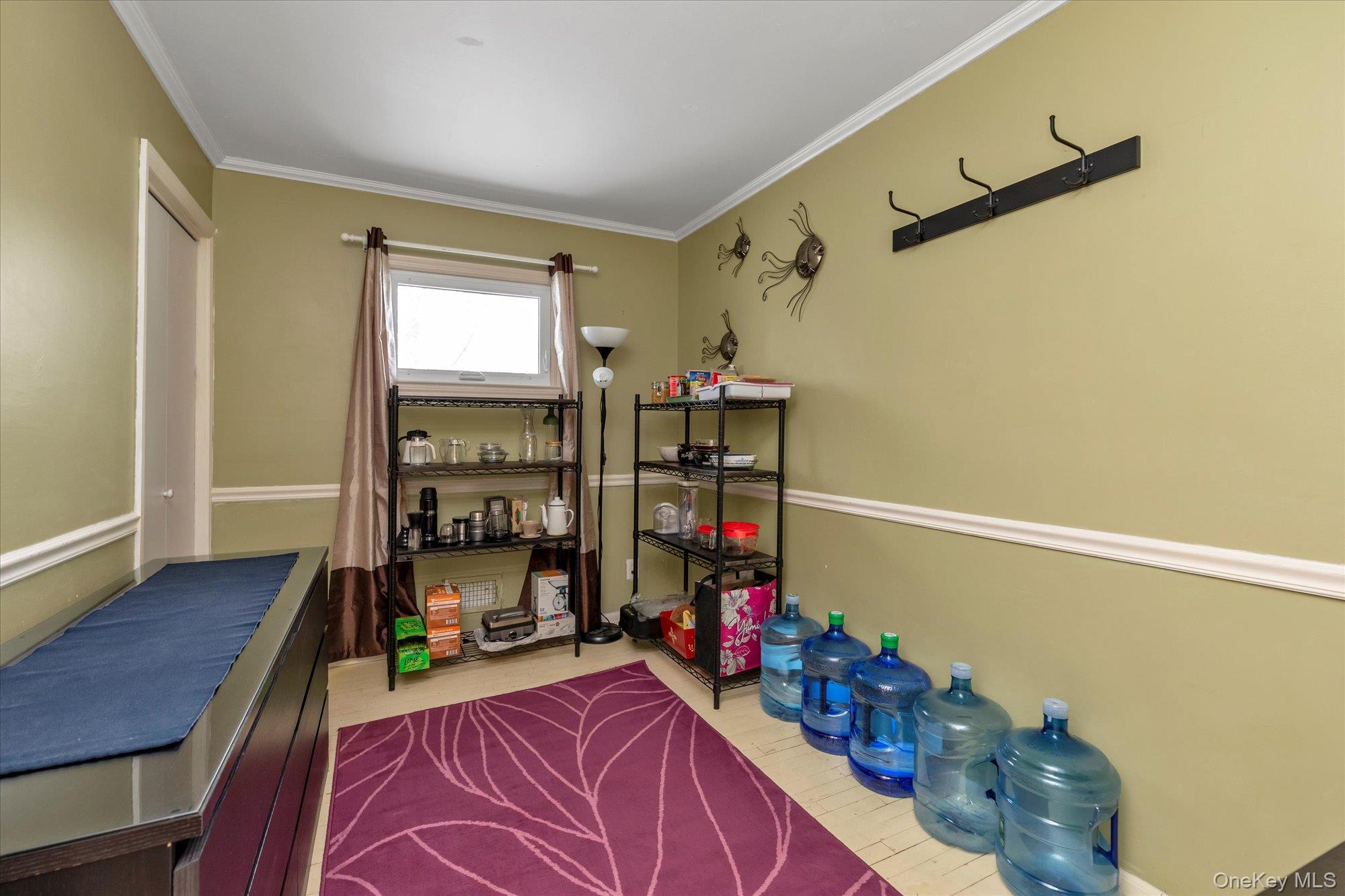 31 Steven Street Plainview, NY 11803 - Photo 12 of 21 a room with lots of white furniture and wooden floor