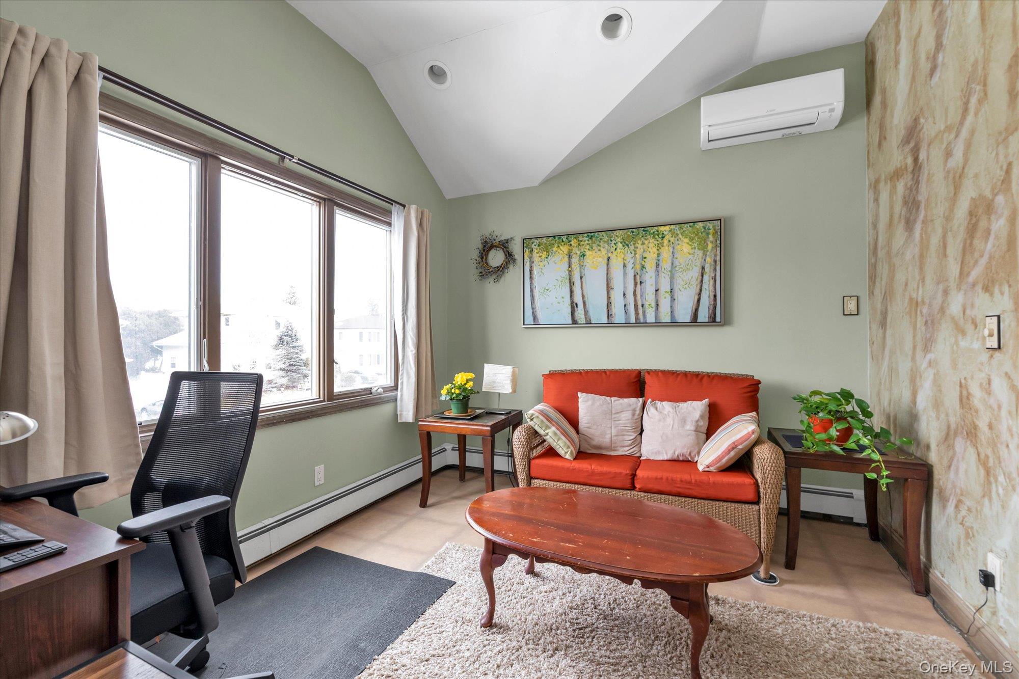31 Steven Street Plainview, NY 11803 - Photo 13 of 21 a living room with furniture and floor to ceiling windows