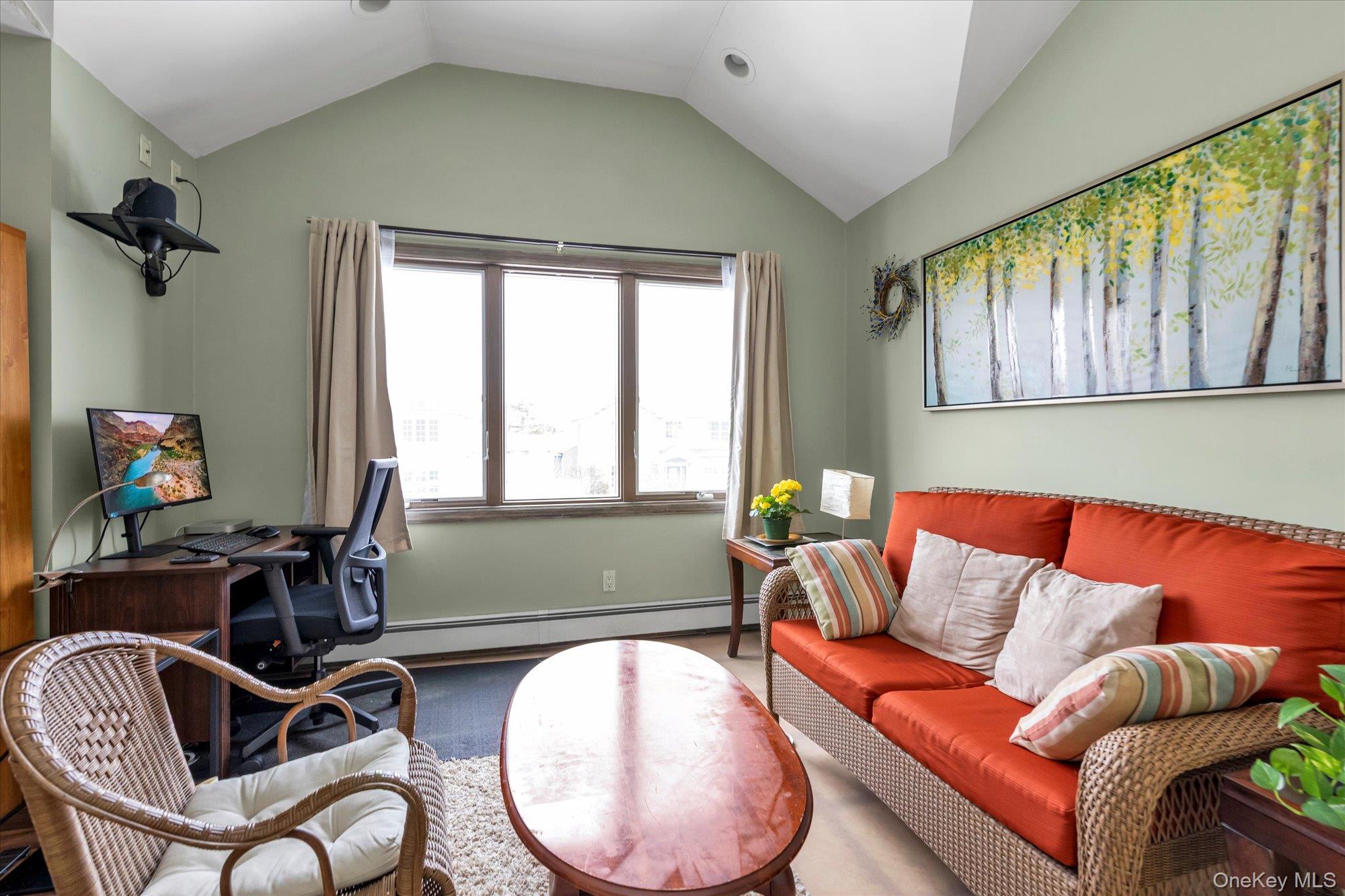 31 Steven Street Plainview, NY 11803 - Photo 14 of 21 a living room with furniture and a window