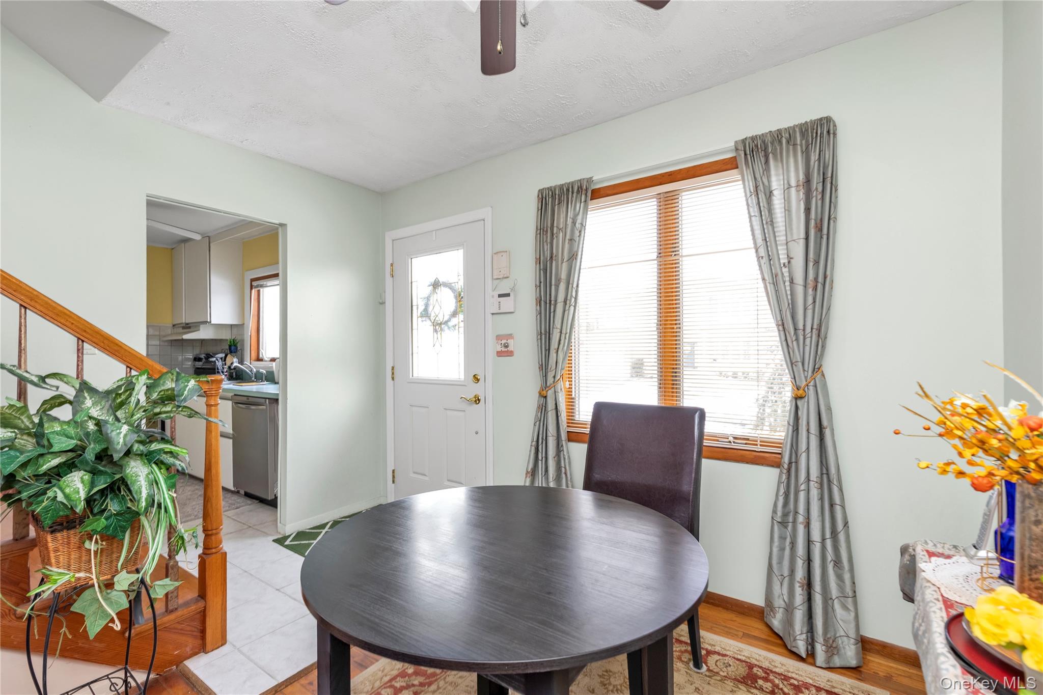 31 Steven Street Plainview, NY 11803 - Photo 2 of 21 a view of a livingroom with furniture and a potted plant