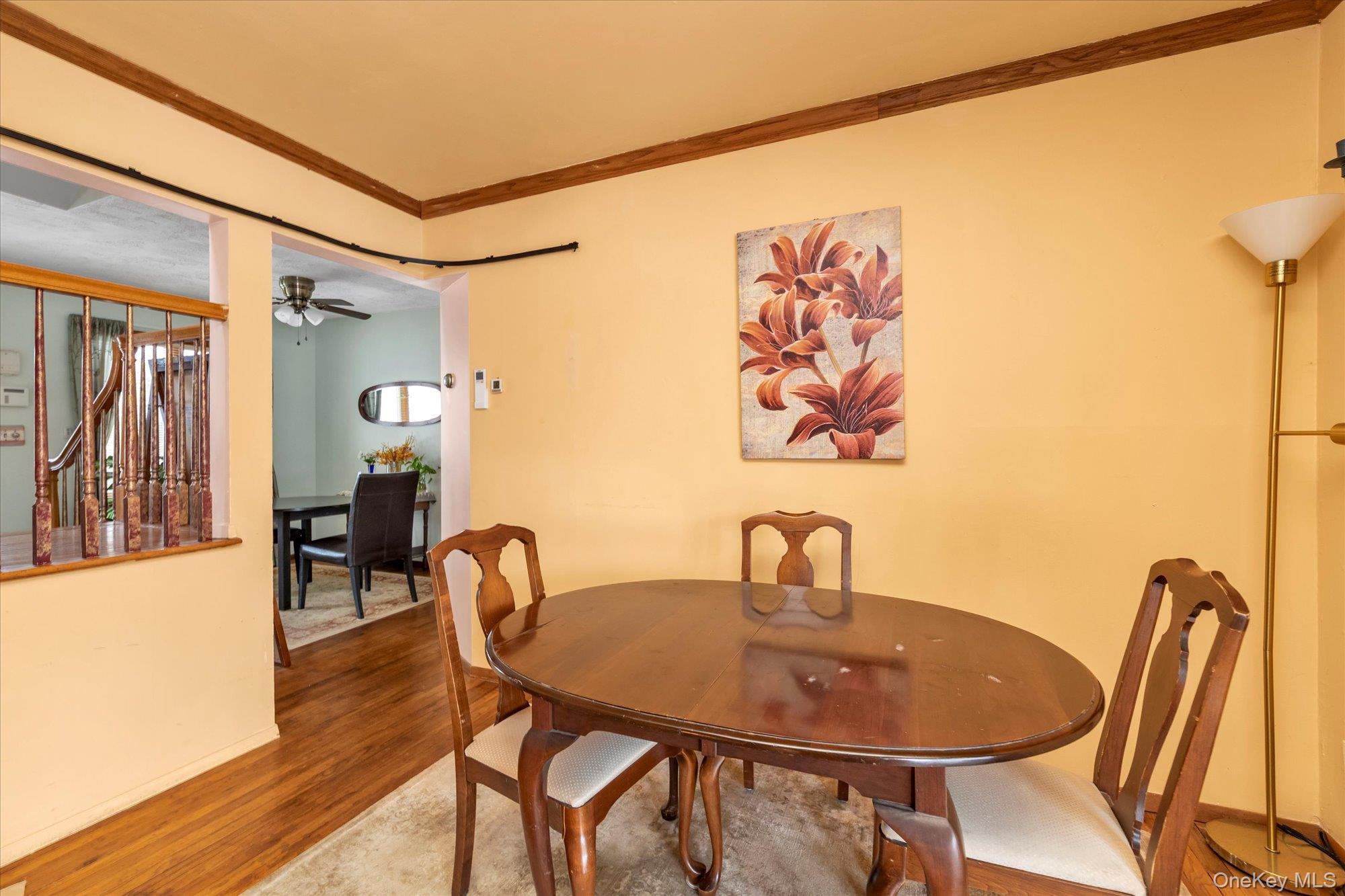 31 Steven Street Plainview, NY 11803 - Photo 5 of 21 a dining room with furniture and wooden floor