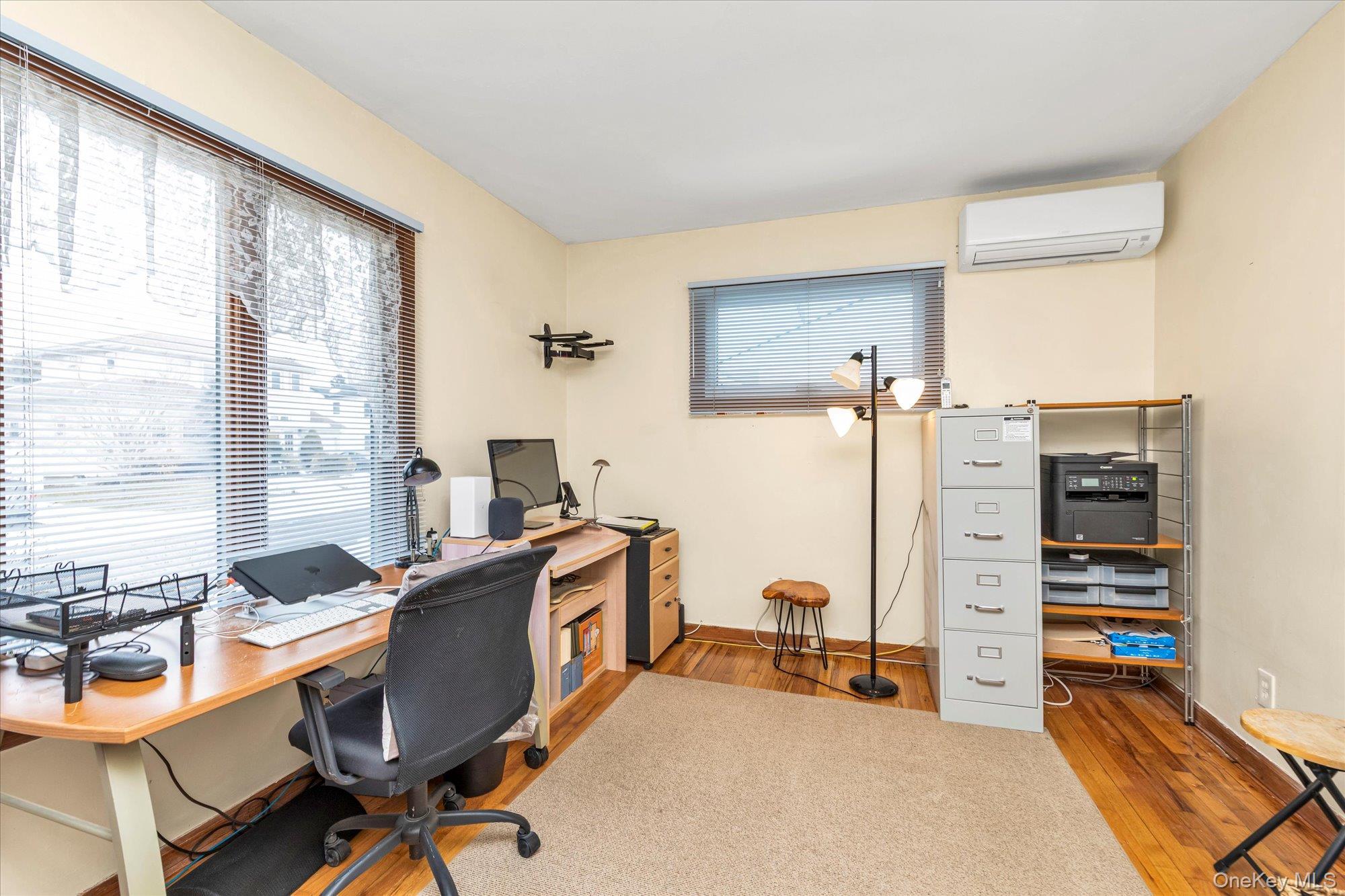 31 Steven Street Plainview, NY 11803 - Photo 8 of 21 a view of a workspace with furniture and a window