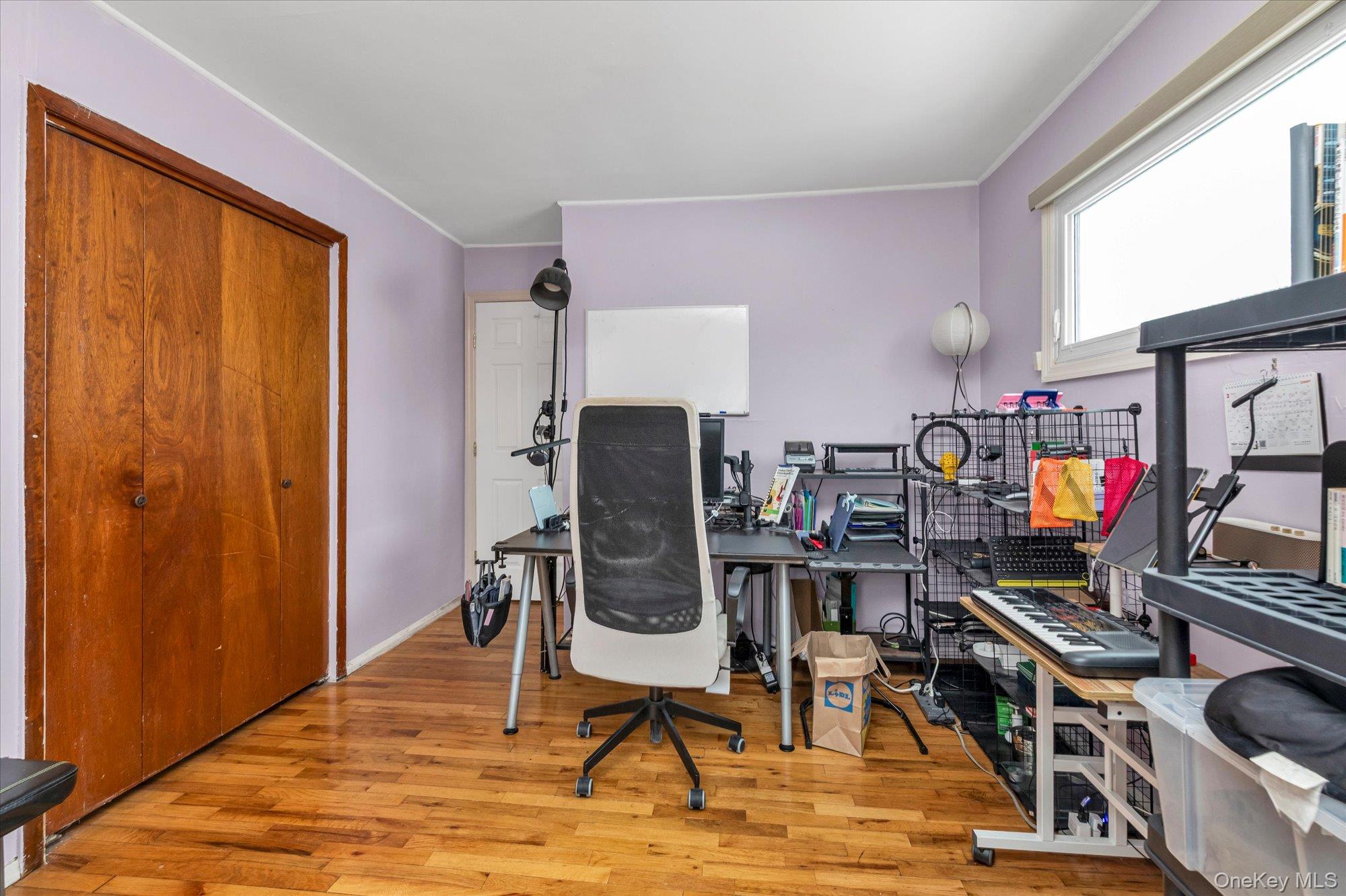 31 Steven Street Plainview, NY 11803 - Photo 10 of 21 a view of a workspace with furniture and a window