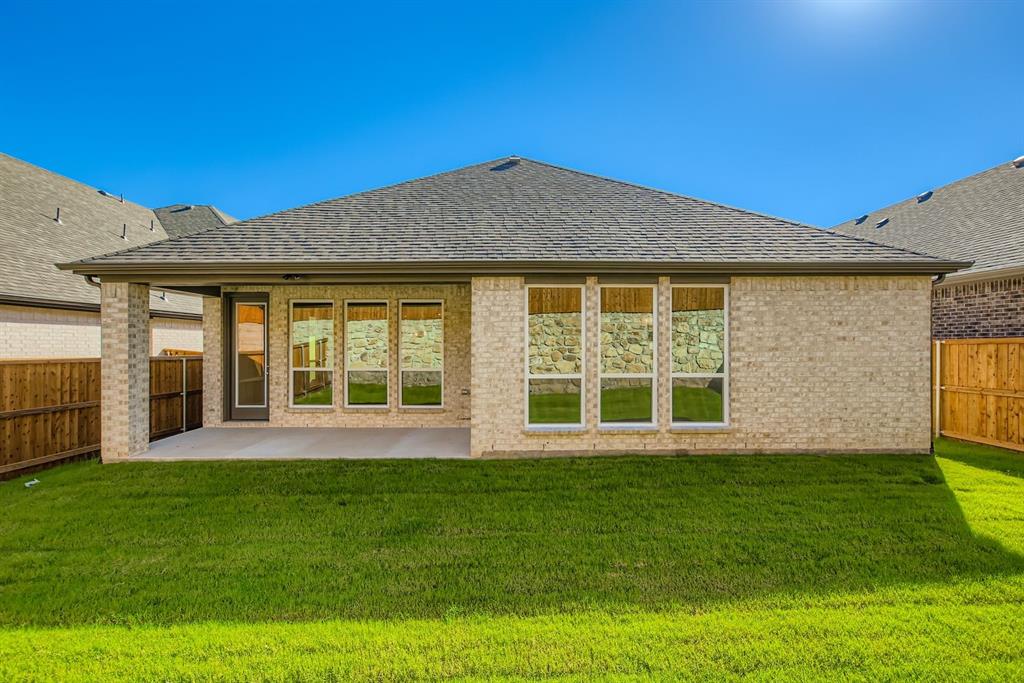 4123 Windy Point Court Oak Point, TX 75068 - Photo 29 of 29 a view of a house with a garden