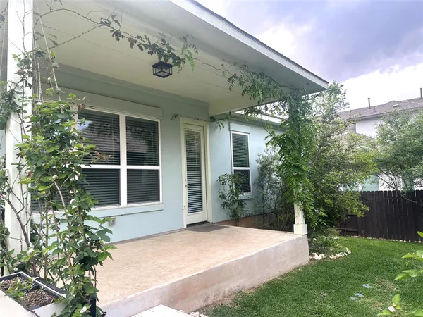 a view of a porch with a yard