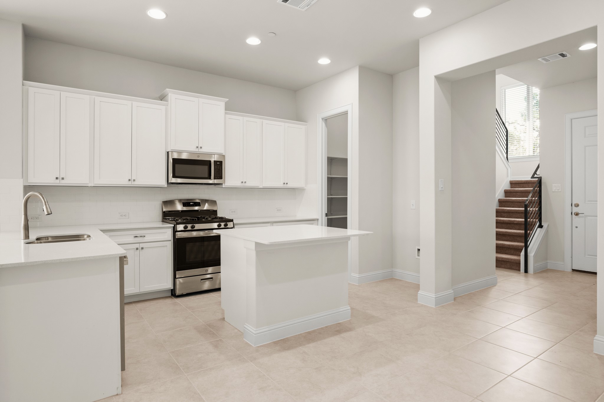 600 C-Bar Ranch Trail, Unit 144 Cedar Park, TX 78613 - Photo 10 of 17 a kitchen with cabinets and appliances