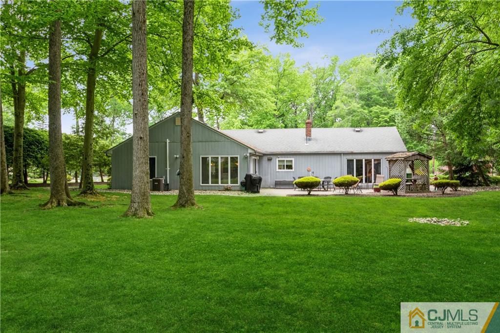 18 Frances Road Edison, NJ 08820 - Photo 29 of 29 a front view of a house with a garden