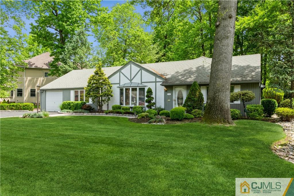 18 Frances Road Edison, NJ 08820 - Photo 3 of 29 a front view of a house with a yard