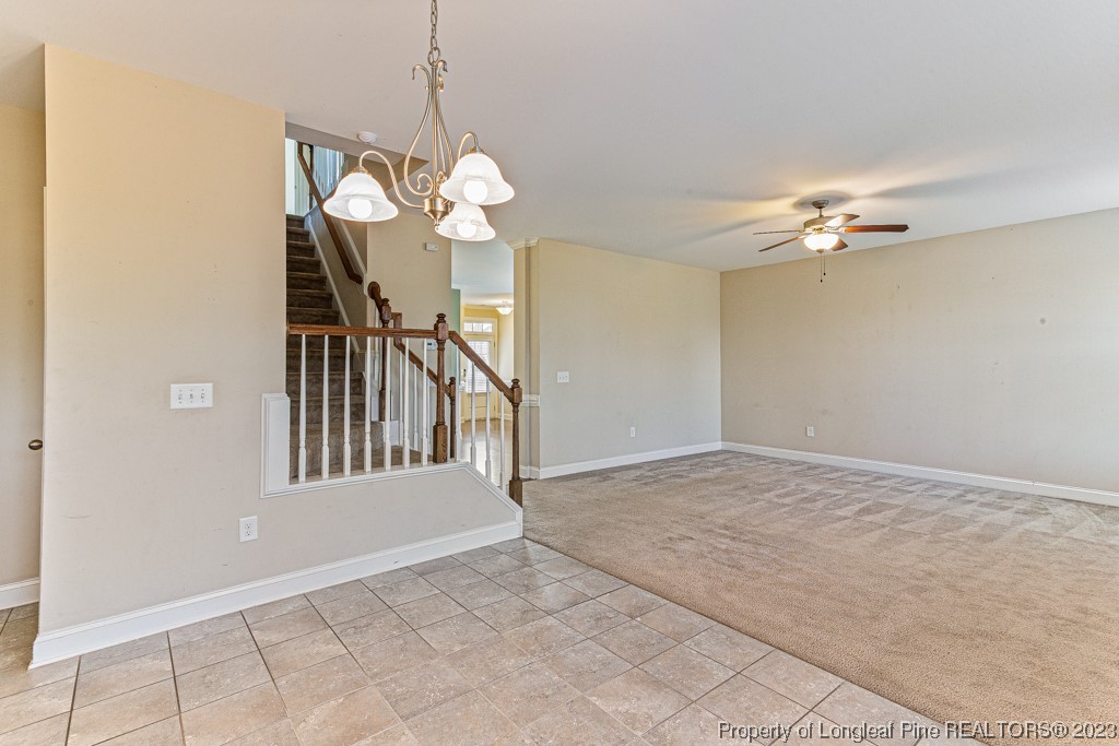 30 Appomattox Drive Cameron, NC 28326 - Photo 11 of 33 a view of a livingroom with a chandelier fan and windows