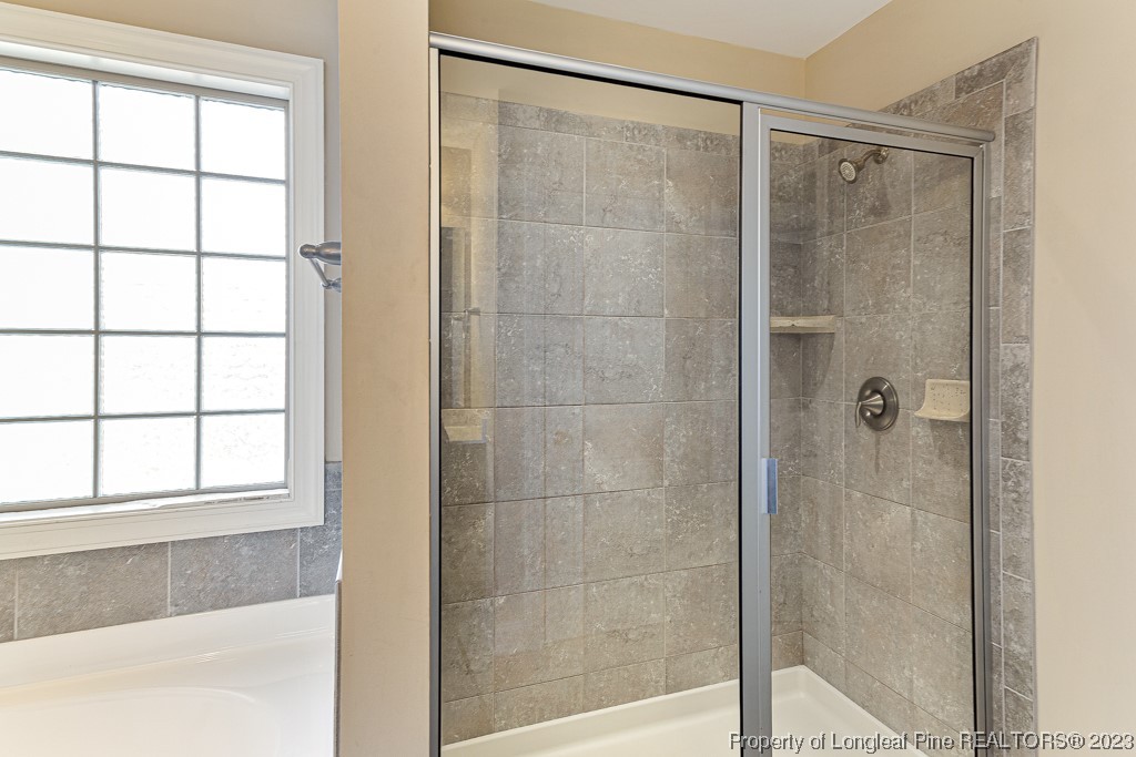 30 Appomattox Drive Cameron, NC 28326 - Photo 17 of 33 a bathroom with a shower