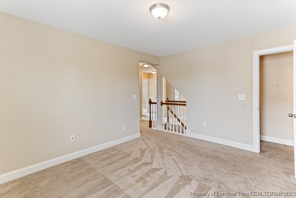 30 Appomattox Drive Cameron, NC 28326 - Photo 23 of 33 wooden floor in an empty room with a window