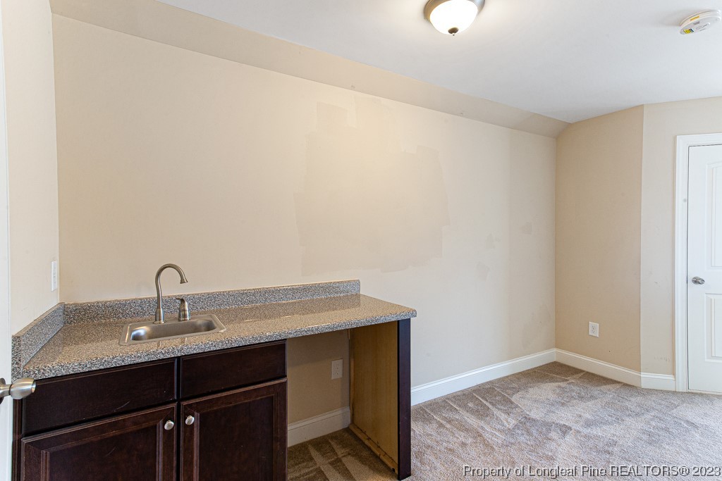30 Appomattox Drive Cameron, NC 28326 - Photo 25 of 33 a bathroom with a sink and a mirror