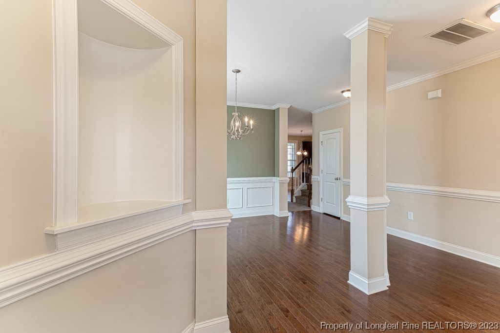30 Appomattox Drive Cameron, NC 28326 - Photo 3 of 33 a view of an empty room with wooden floor and a bathroom