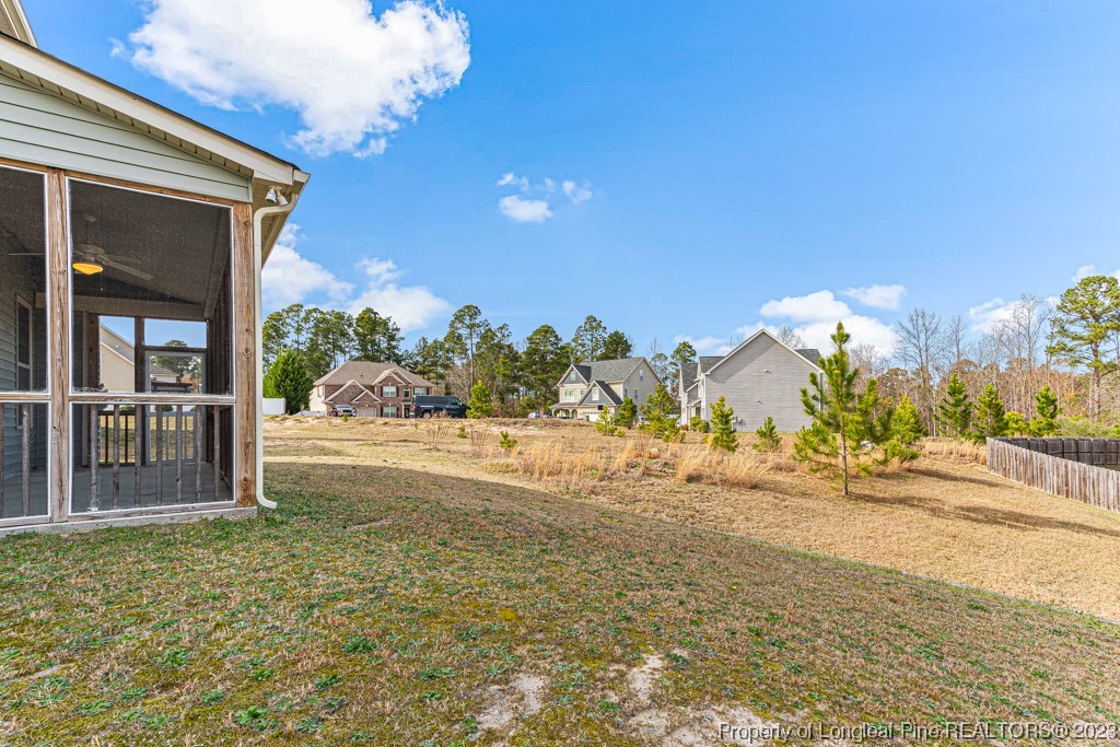 30 Appomattox Drive Cameron, NC 28326 - Photo 33 of 33 a view of a house with backyard and tree