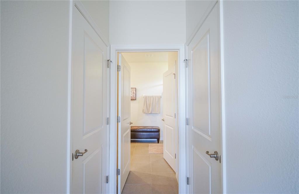 6250 Southwest 89th Ln Road Ocala, FL 34476 - Photo 23 of 71 a view of a bathroom from a hallway