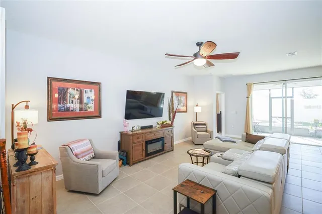 a kitchen with kitchen island a sink stove and refrigerator