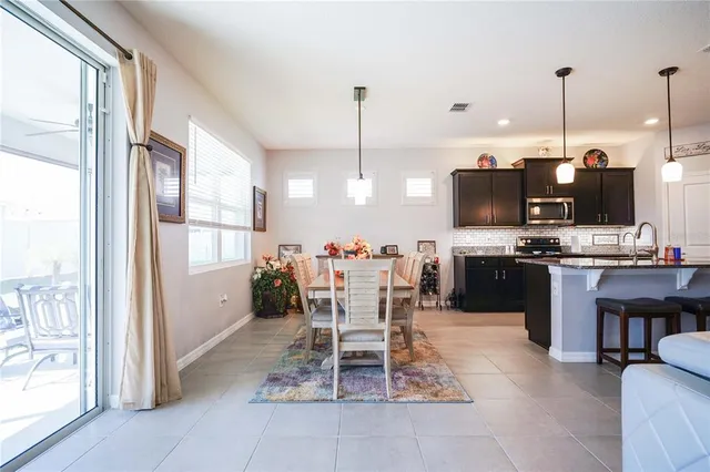 a view of a park with large trees