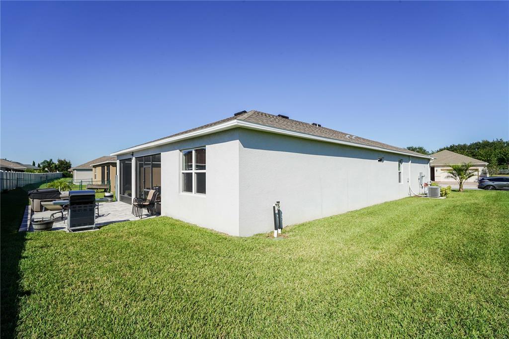 6250 Southwest 89th Ln Road Ocala, FL 34476 - Photo 50 of 71 a backyard of a house with table and chairs
