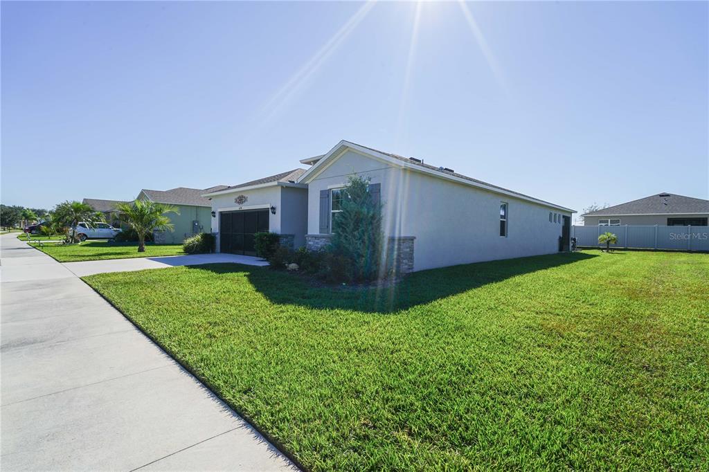 6250 Southwest 89th Ln Road Ocala, FL 34476 - Photo 6 of 71 a view of a house with backyard and garden
