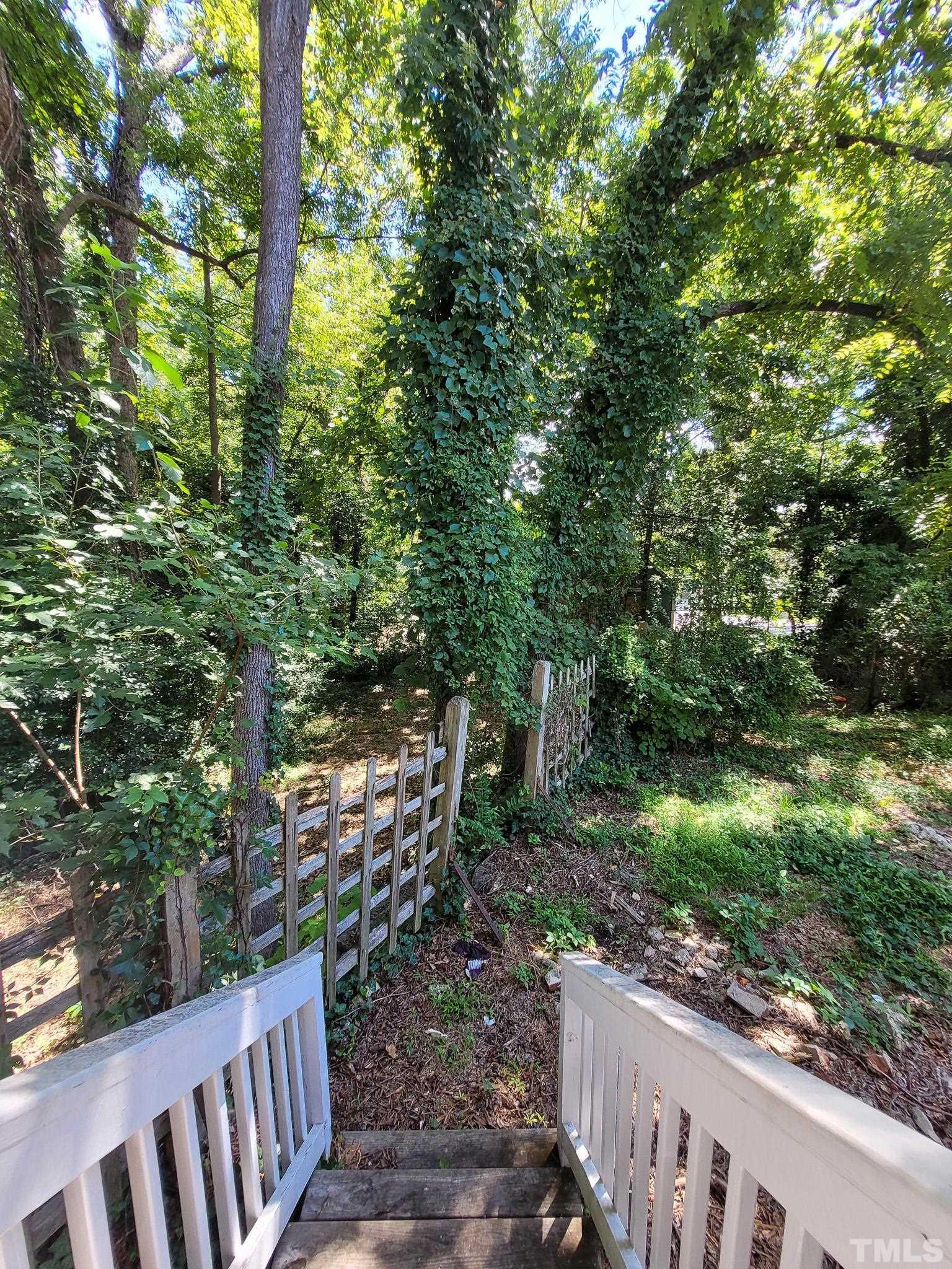 802 Park Avenue, Unit B Durham, NC 27703 - Photo 22 of 23 a view of a wooden fence
