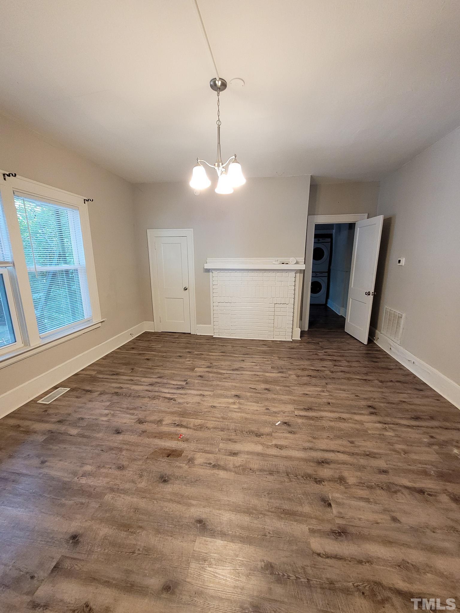 802 Park Avenue, Unit B Durham, NC 27703 - Photo 8 of 23 a view of a livingroom with a window