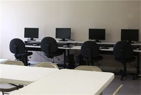 a dinning table and chairs in a room