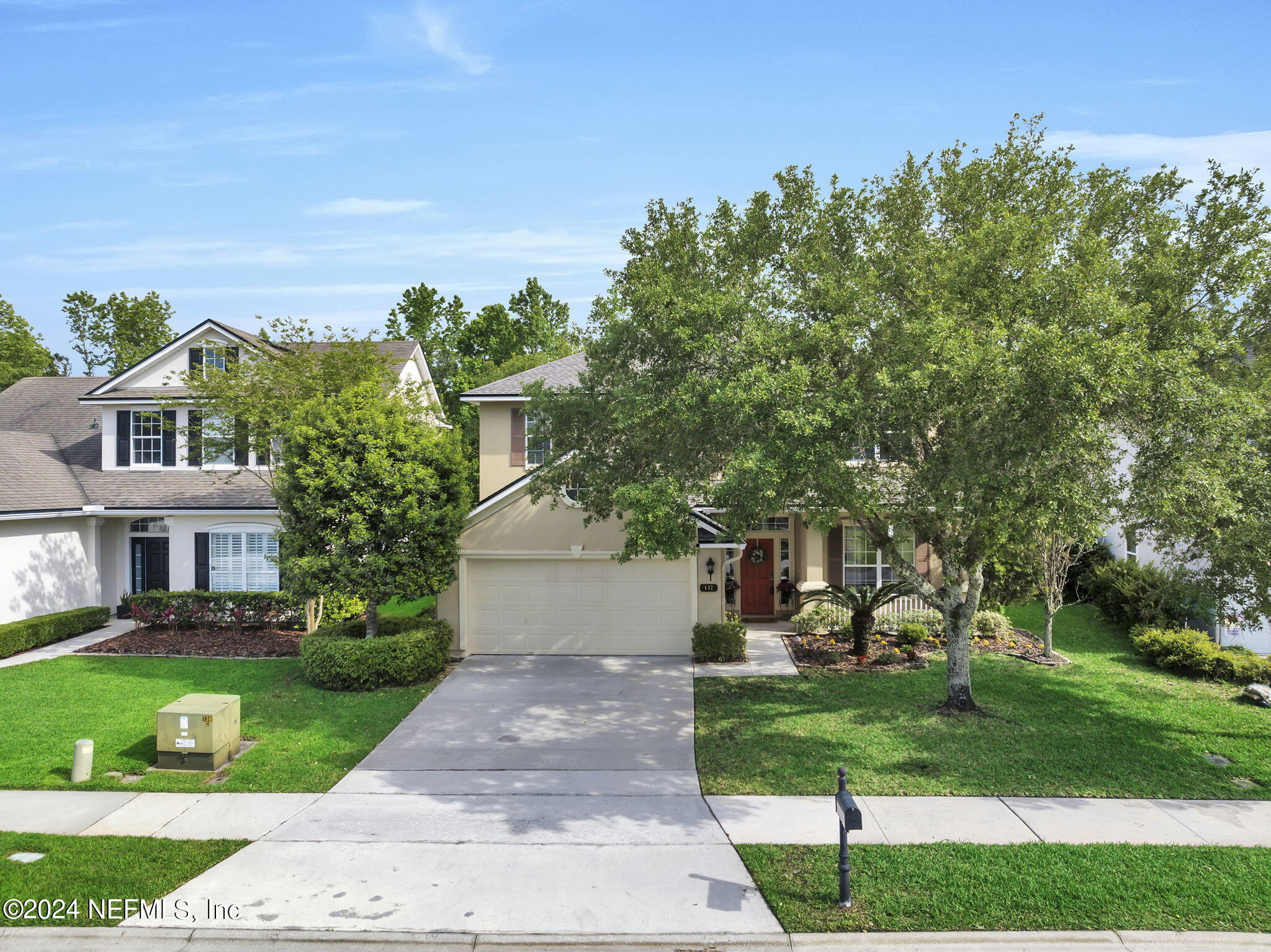 137 Castlegate Lane St. Johns, FL 32259 - Photo 1 of 65 a front view of a house with a yard