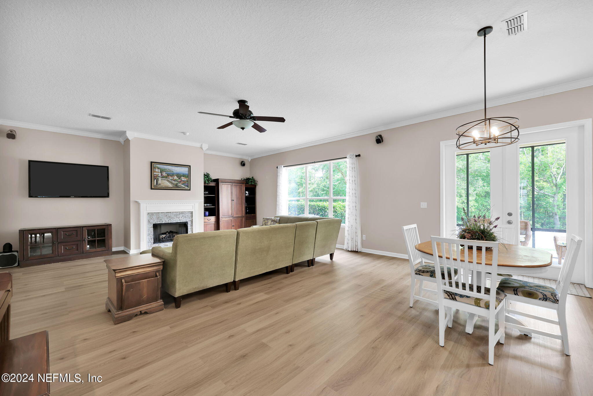 137 Castlegate Lane St. Johns, FL 32259 - Photo 19 of 65 a living room with furniture and a flat screen tv