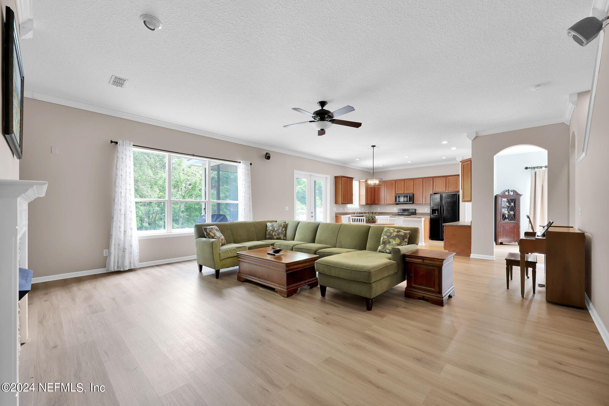 137 Castlegate Lane St. Johns, FL 32259 - Photo 23 of 65 a living room with furniture and a large window