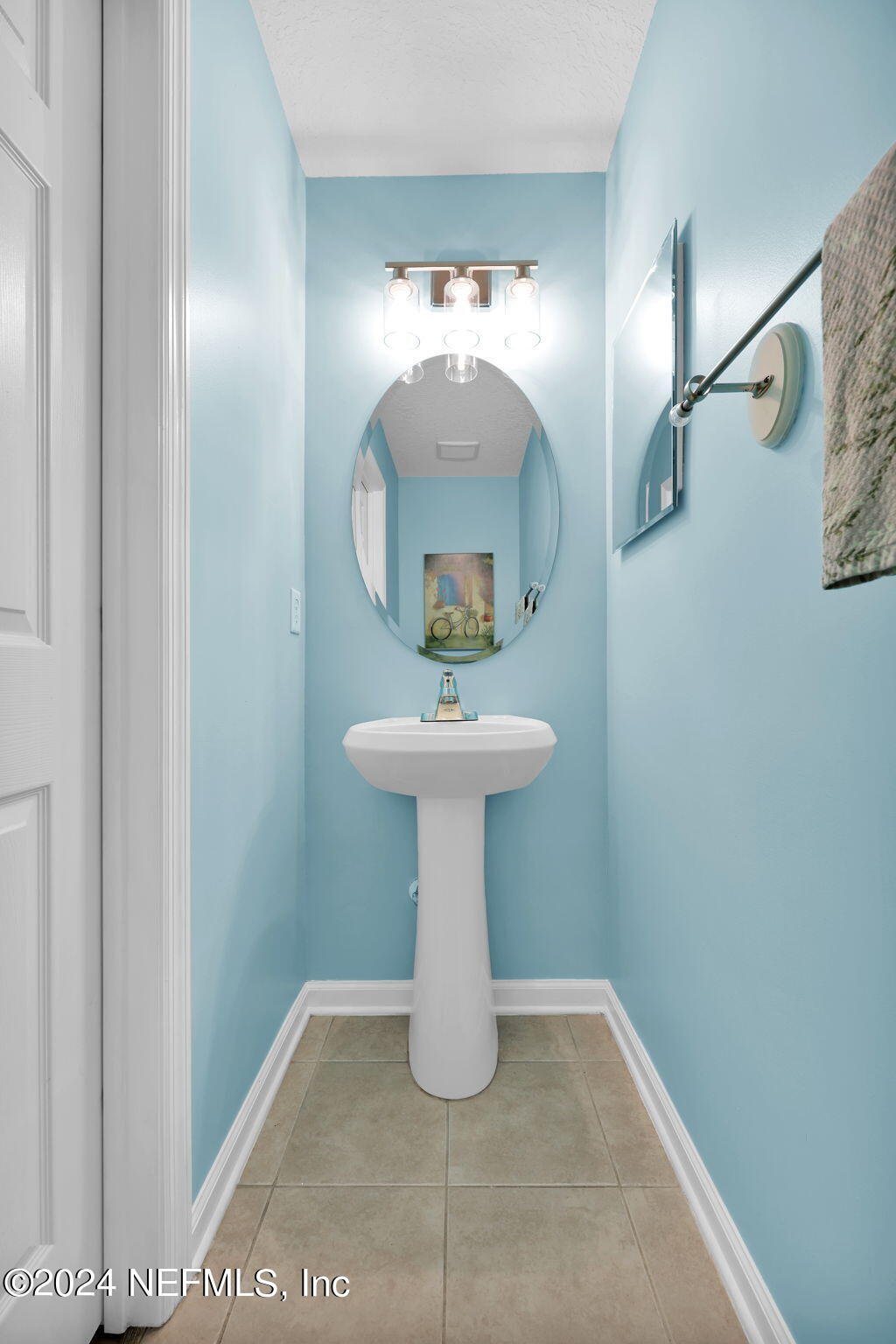 137 Castlegate Lane St. Johns, FL 32259 - Photo 24 of 65 a bathroom with a sink and a mirror