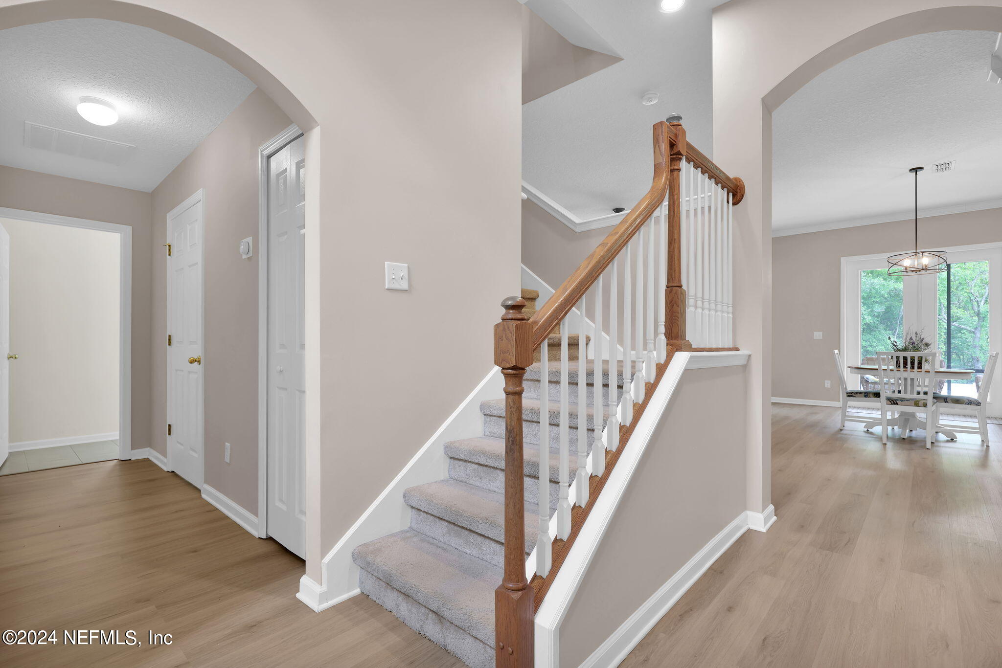 137 Castlegate Lane St. Johns, FL 32259 - Photo 26 of 65 a view of a hallway with wooden floor and staircase