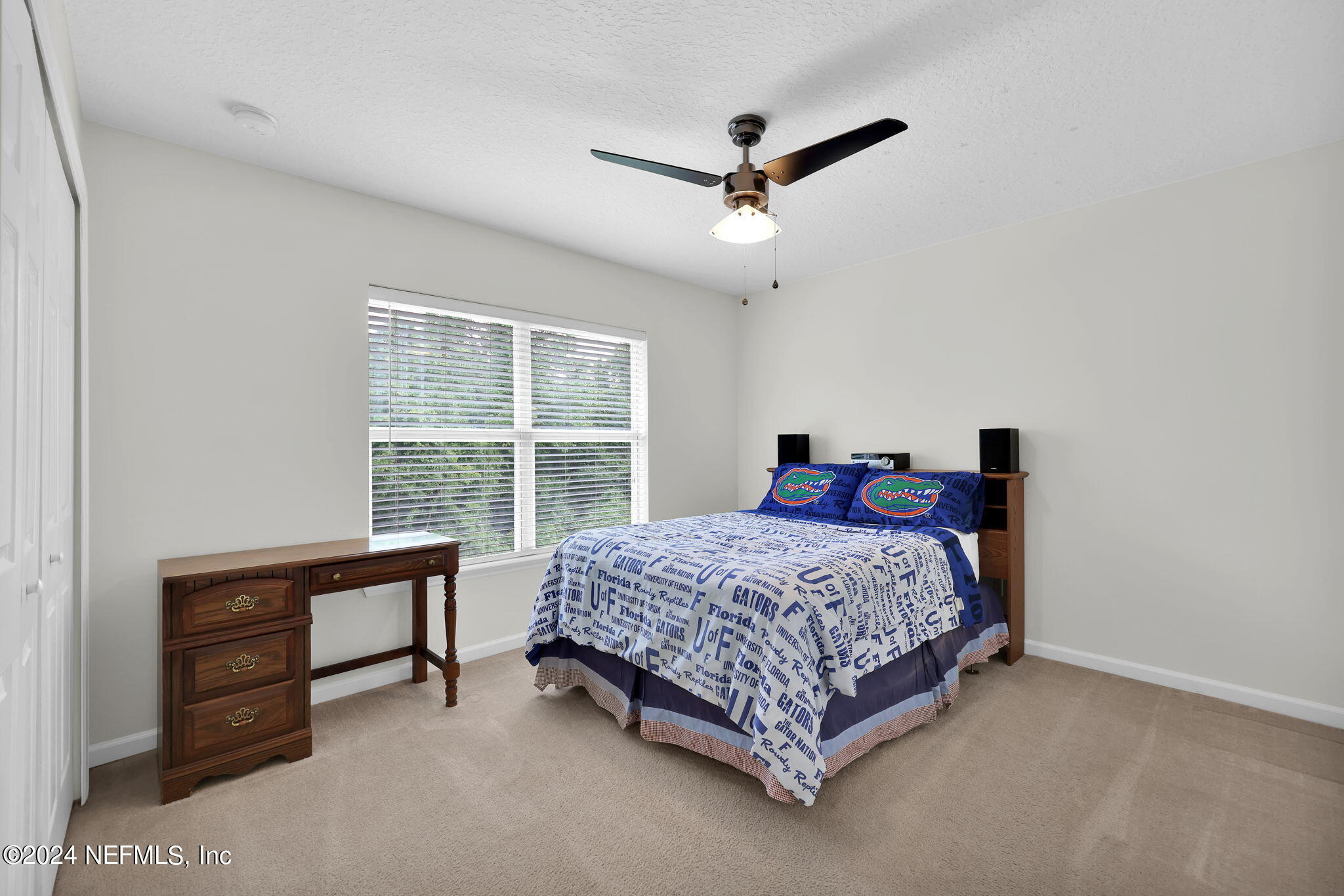 137 Castlegate Lane St. Johns, FL 32259 - Photo 40 of 65 a bedroom with a bed and a window