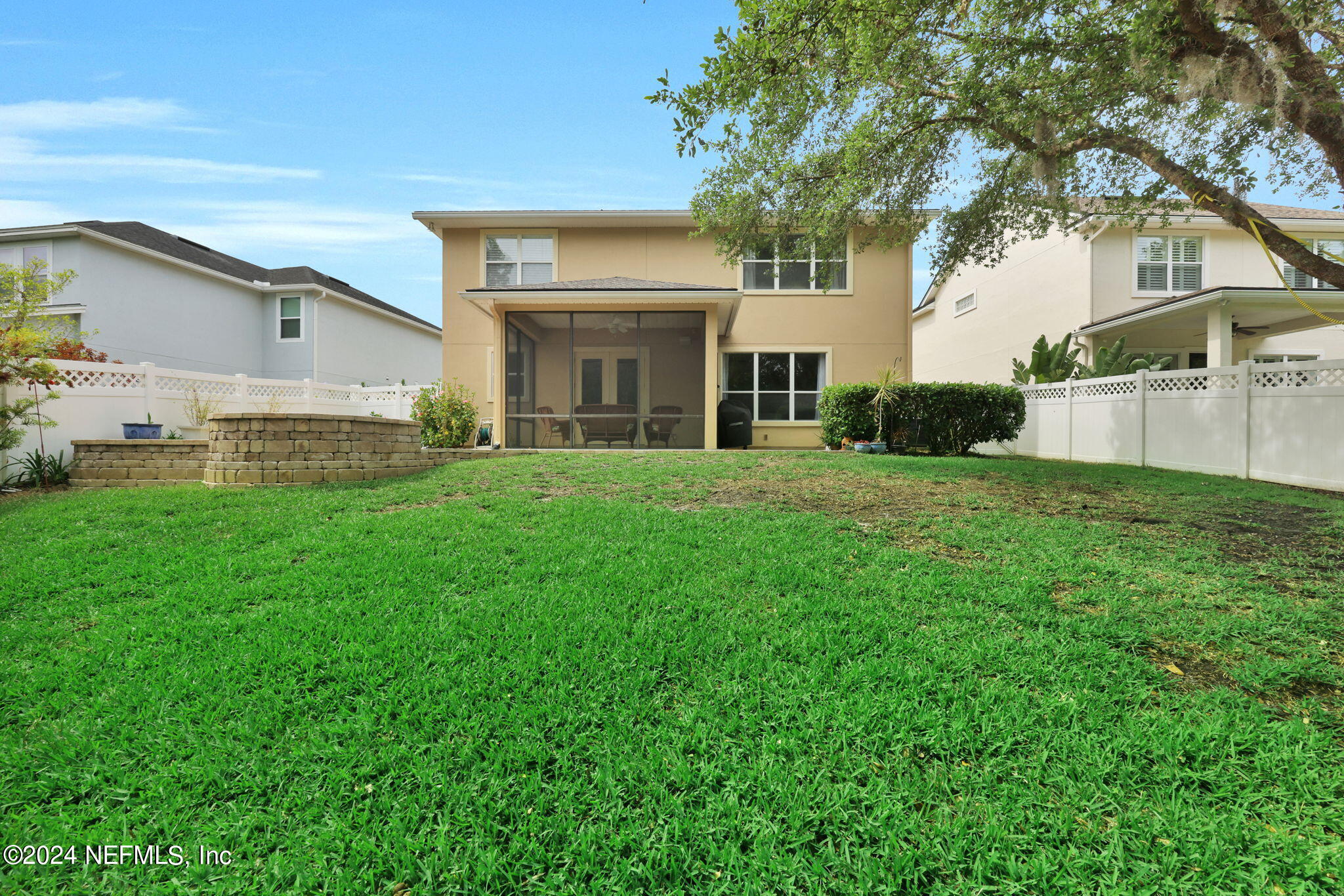137 Castlegate Lane St. Johns, FL 32259 - Photo 43 of 65 a view of a house with a big yard and large trees