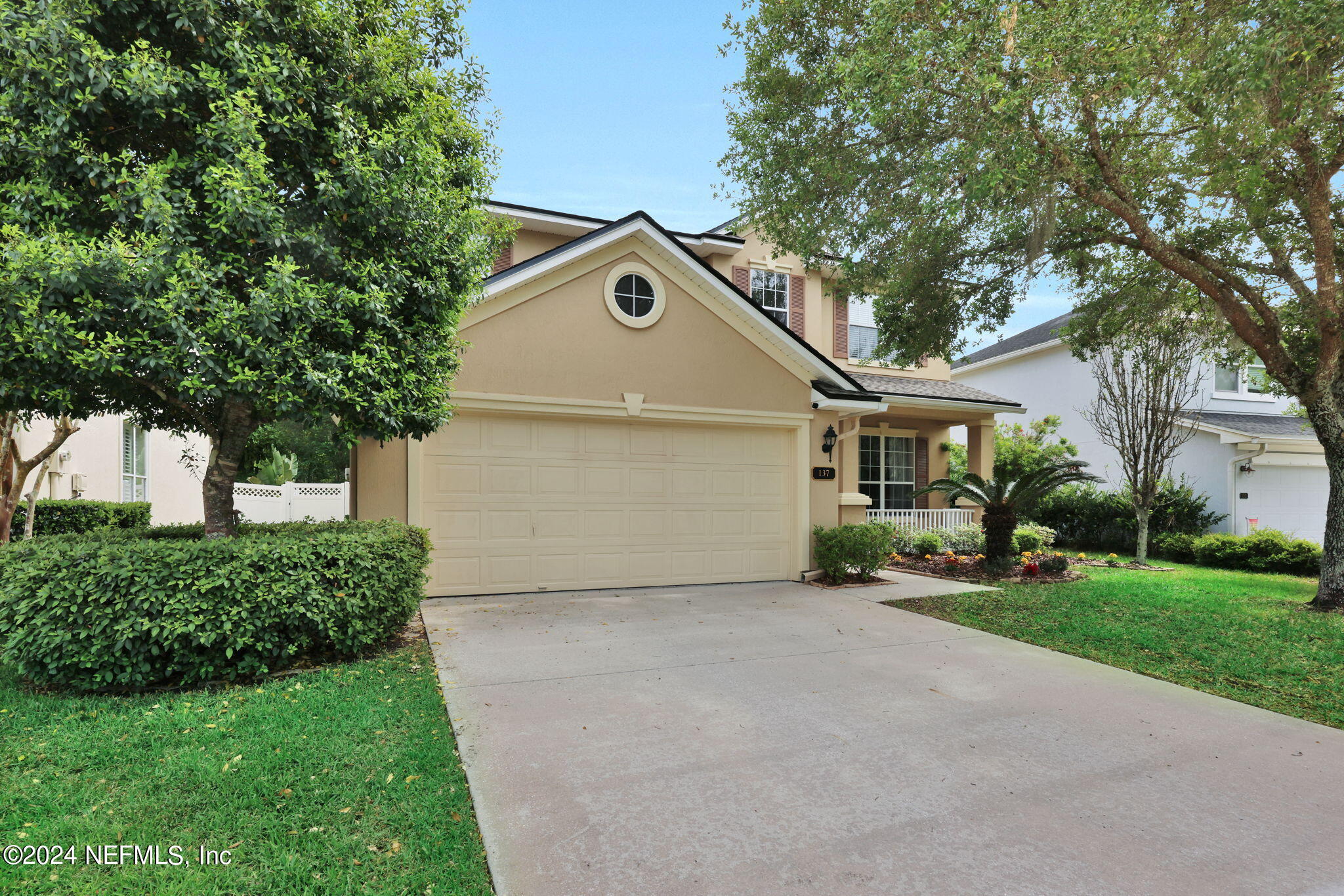 137 Castlegate Lane St. Johns, FL 32259 - Photo 5 of 65 a front view of a house with a yard