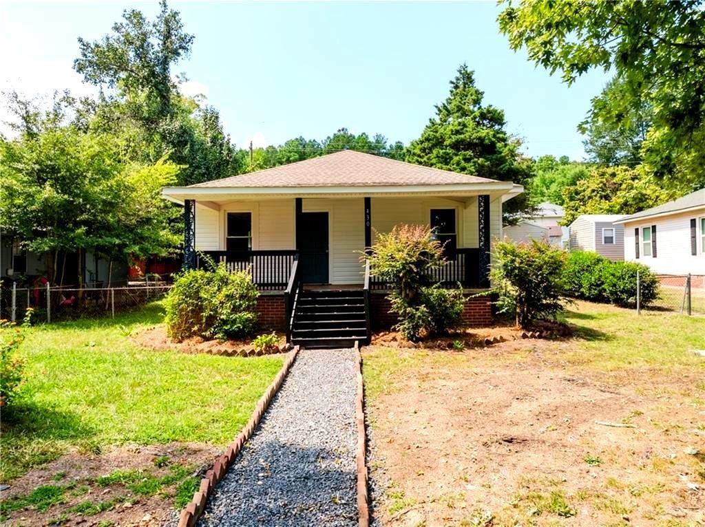 430 East 3rd Street Rome, GA 30161 - Photo 2 of 23 a view of a house with backyard and sitting area