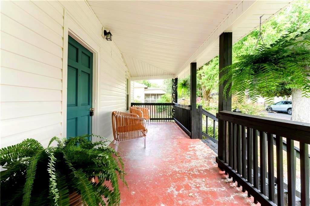 430 East 3rd Street Rome, GA 30161 - Photo 3 of 23 a view of a porch with chairs and backyard