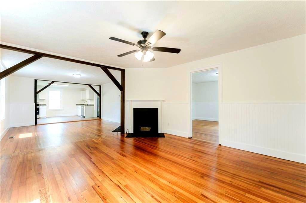 430 East 3rd Street Rome, GA 30161 - Photo 7 of 23 a view of empty room with wooden floor and fan