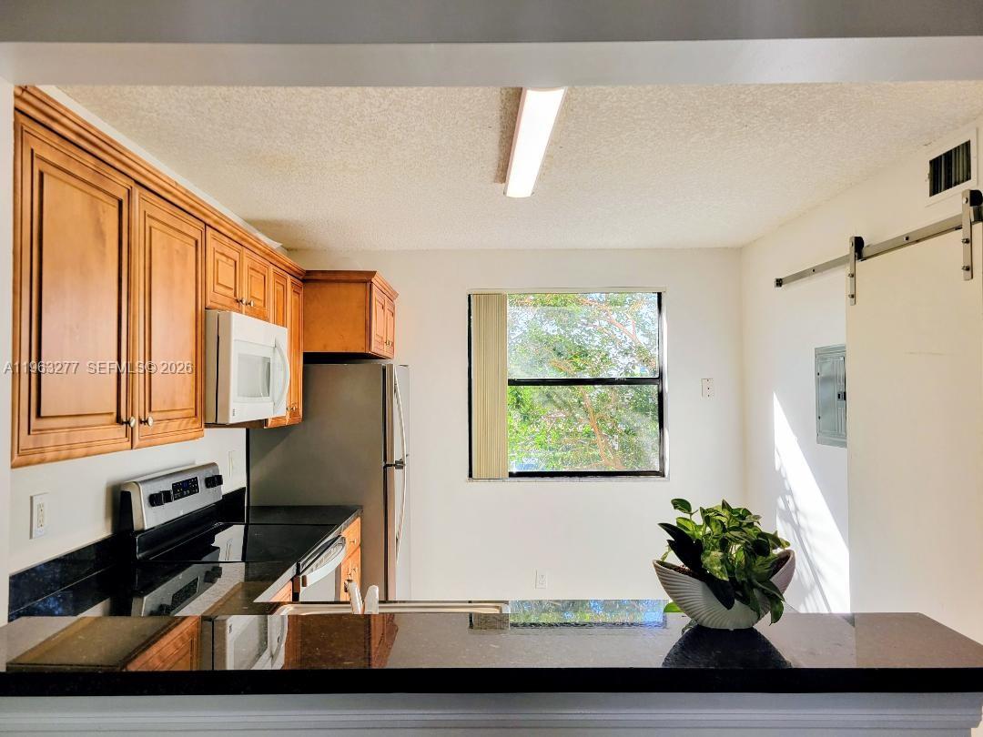 5701 Riverside Drive, Unit 201B6 Coral Springs, FL 33067 - Photo 4 of 23