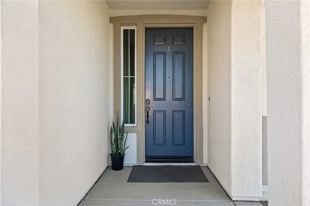a view of front door with a hallway