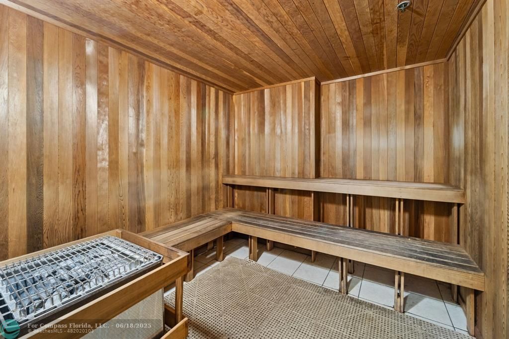 1830 Radius Drive, Unit 605 Hollywood, FL 33020 - Photo 30 of 38 a bedroom with furniture and a window