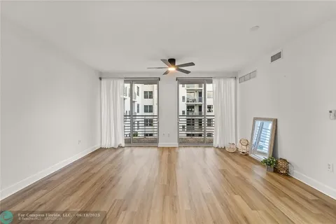a kitchen with stainless steel appliances a sink stove and refrigerator