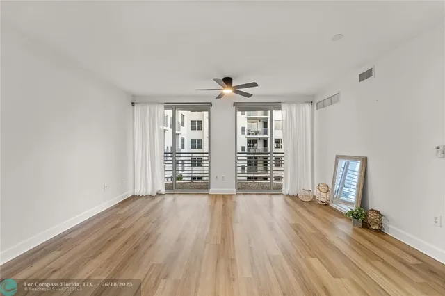 a kitchen with stainless steel appliances a sink stove and refrigerator