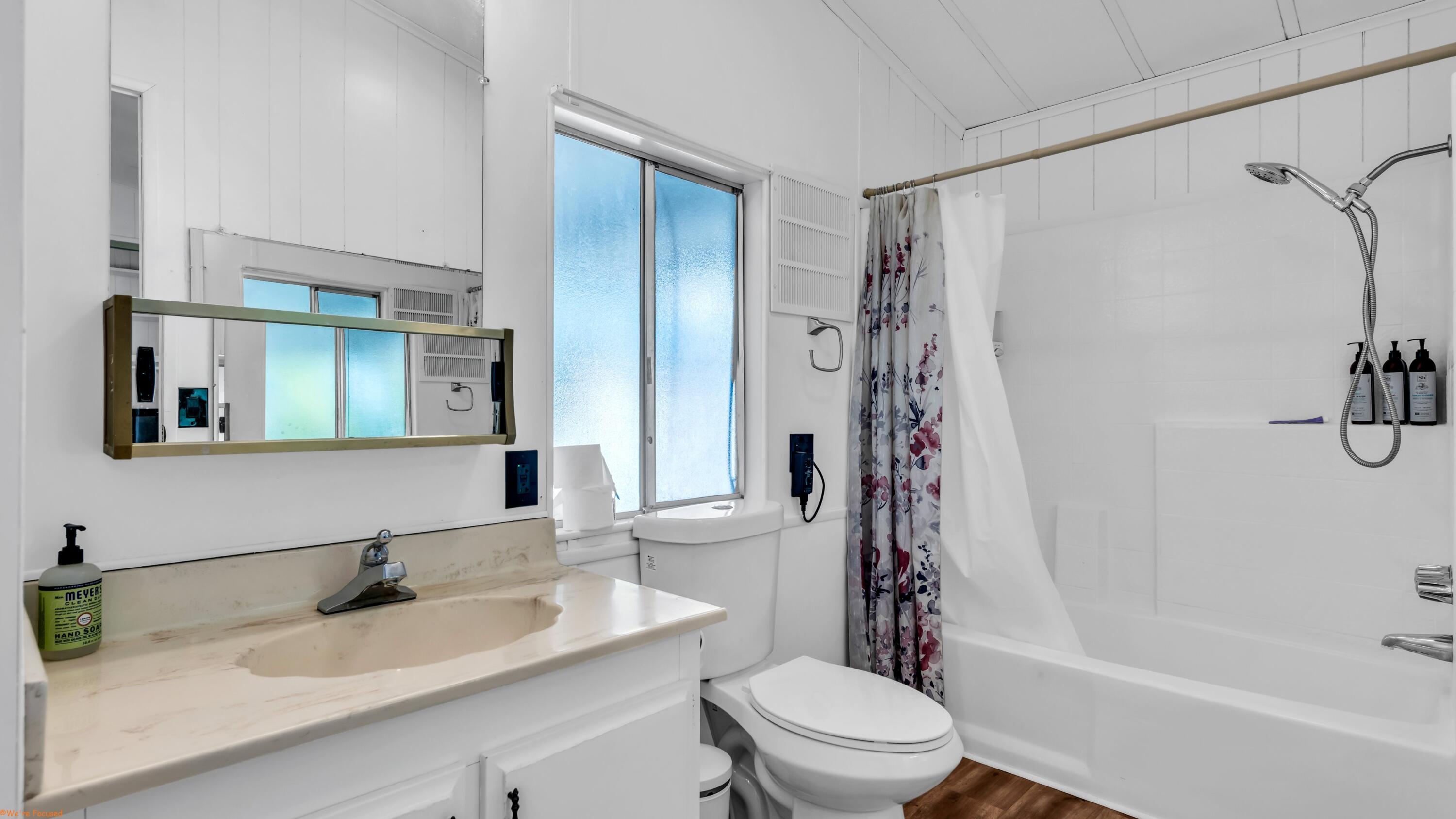 74711 Dillon Road, Unit 392 Desert Hot Springs, CA 92241 - Photo 15 of 46 a bathroom with a sink a toilet and shower