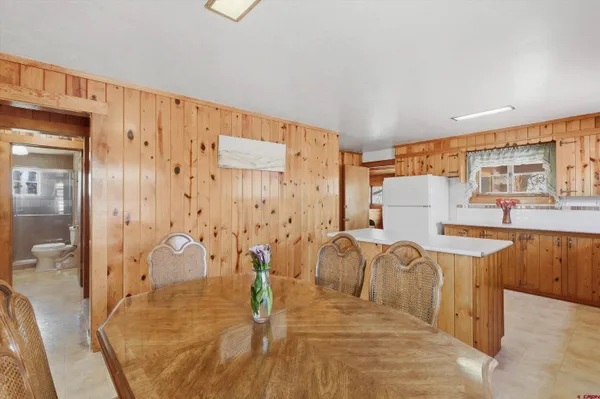 a kitchen with a stove a sink and a microwave