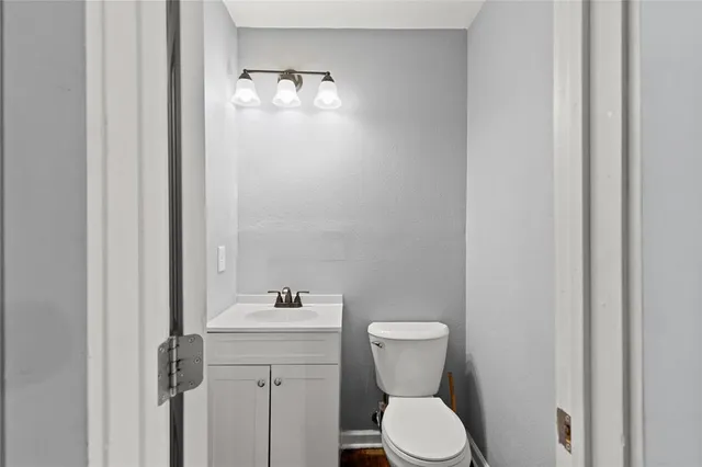 a bathroom with a toilet a sink and a bathtub