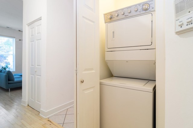 2441 West Harrison Street, Unit 1 Chicago, IL 60612 - Photo 9 of 10 a utility room with dryer and washer