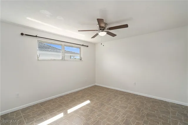 a view of a big room with carpet