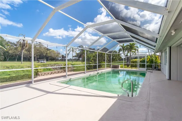 a view of a house with a swimming pool
