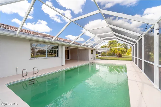 a large white building with a view of front door